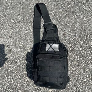 “Black Tactical Sling/Chest Bag – Waterproof, Triple Storage, Hook Carry Slot”
